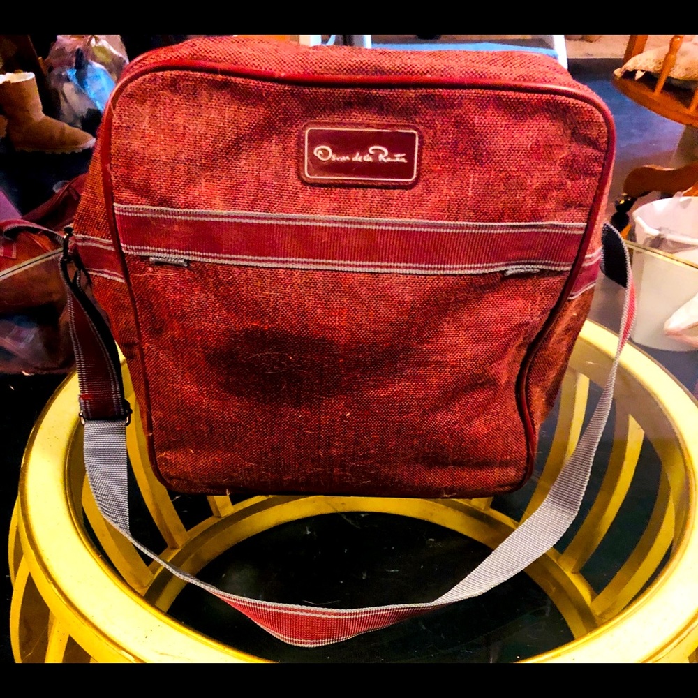Vintage Oscar de la Renta luggage over the shoulder night bag.